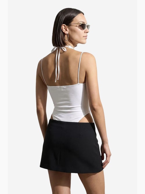 Body senza maniche con cut-out ricamati dilvin - Kiabi Body senza maniche con cut-out ricamati dilvin - Kiabi