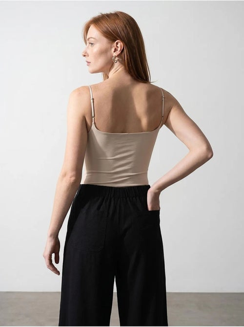 Body senza maniche in nylon con scollo quadrato dilvin - Kiabi Body senza maniche in nylon con scollo quadrato dilvin - Kiabi