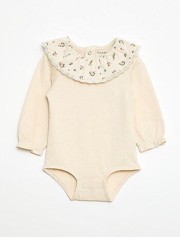 Body tinta unita con colletto Claudine stampato