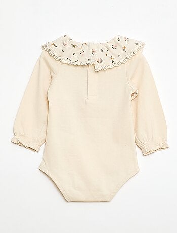 Body tinta unita con colletto Claudine stampato