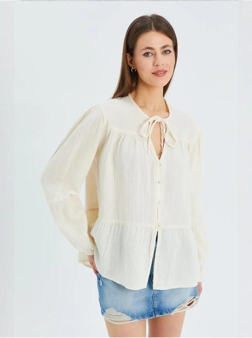 Camicetta a maniche lunghe dalla vestibilità relaxed con fiocco al collo mixray - Kiabi Camicetta a maniche lunghe dalla vestibilità relaxed con fiocco al collo mixray - Kiabi
