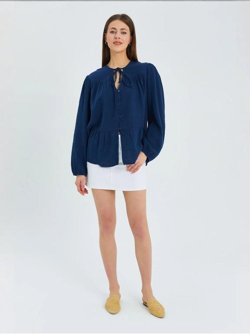 Camicetta a maniche lunghe dalla vestibilità relaxed con fiocco al collo mixray - Kiabi Camicetta a maniche lunghe dalla vestibilità relaxed con fiocco al collo mixray - Kiabi