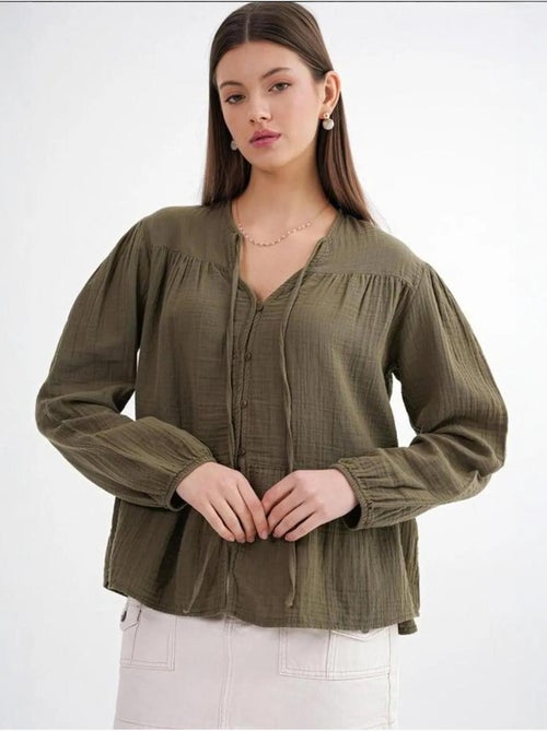 Camicetta a maniche lunghe dalla vestibilità relaxed con fiocco al collo mixray - Kiabi Camicetta a maniche lunghe dalla vestibilità relaxed con fiocco al collo mixray - Kiabi