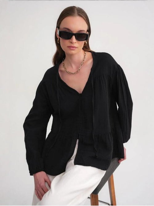 Camicetta a maniche lunghe dalla vestibilità relaxed con fiocco al collo mixray - Kiabi Camicetta a maniche lunghe dalla vestibilità relaxed con fiocco al collo mixray - Kiabi