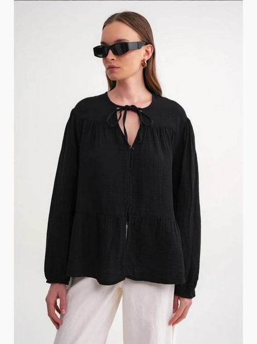 Camicetta a maniche lunghe dalla vestibilità relaxed con fiocco al collo mixray - Kiabi Camicetta a maniche lunghe dalla vestibilità relaxed con fiocco al collo mixray - Kiabi
