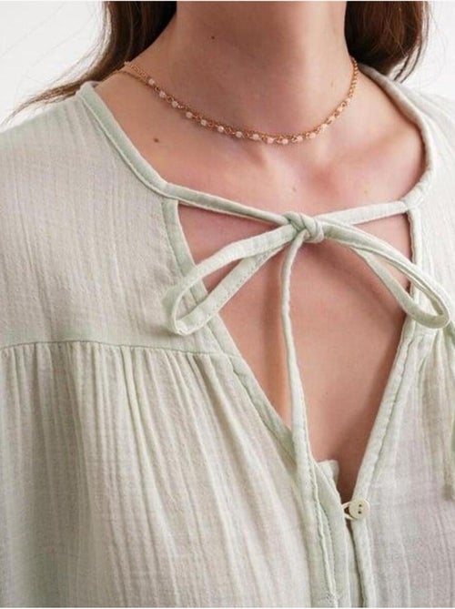 Camicetta a maniche lunghe dalla vestibilità relaxed con fiocco al collo mixray - Kiabi Camicetta a maniche lunghe dalla vestibilità relaxed con fiocco al collo mixray - Kiabi