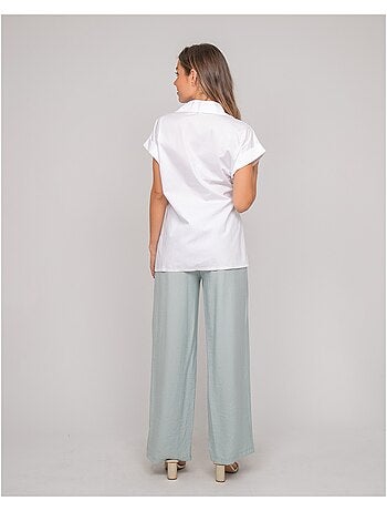 Camicia a maniche corte annodata sul lato OMERVA