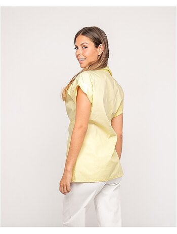 Camicia a maniche corte annodata sul lato OMERVA