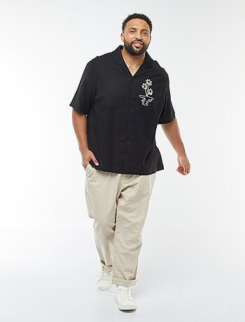 Camicia a maniche corte con ricami fantasia davanti
