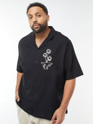 Camicia a maniche corte con ricami fantasia davanti