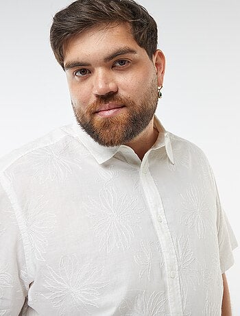 Camicia a maniche corte con ricami floreali all over