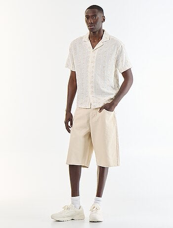 Camicia a maniche corte in maglia fantasia con ricami