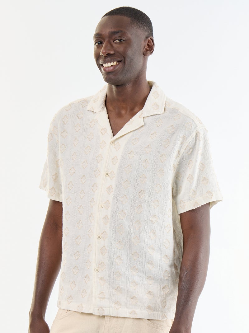 Camicia a maniche corte in maglia fantasia con ricami Beige - Kiabi