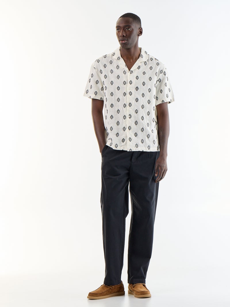 Camicia a maniche corte in maglia fantasia con ricami Nero - Kiabi