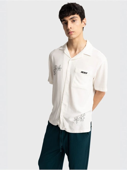 Camicia a maniche corte ricamata in popeline di cotone giesto - Kiabi Camicia a maniche corte ricamata in popeline di cotone giesto - Kiabi