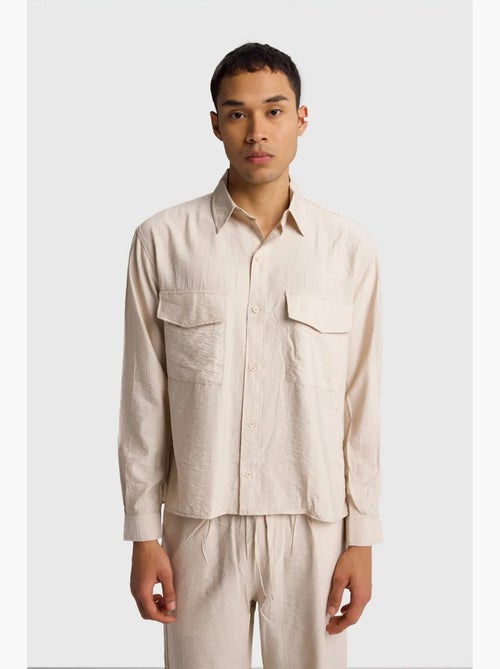 Camicia a maniche lunghe con abbottonatura e tasca giesto - Kiabi Camicia a maniche lunghe con abbottonatura e tasca giesto - Kiabi