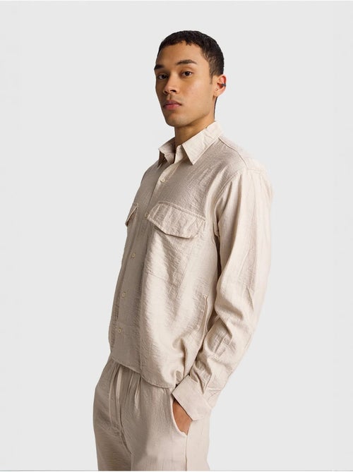 Camicia a maniche lunghe con abbottonatura e tasca giesto - Kiabi Camicia a maniche lunghe con abbottonatura e tasca giesto - Kiabi