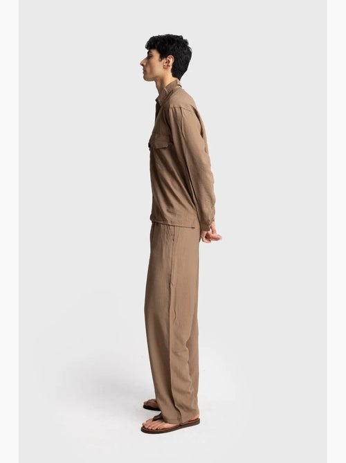 Camicia a maniche lunghe con abbottonatura e tasca giesto - Kiabi Camicia a maniche lunghe con abbottonatura e tasca giesto - Kiabi