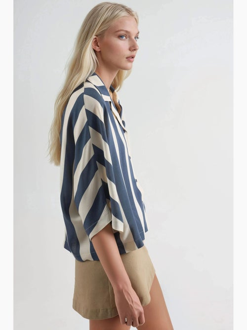 Camicia a righe relaxed fit con abbottonatura busem - Kiabi Camicia a righe relaxed fit con abbottonatura busem - Kiabi