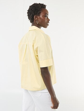 Camicia ampia con bottoni a stella