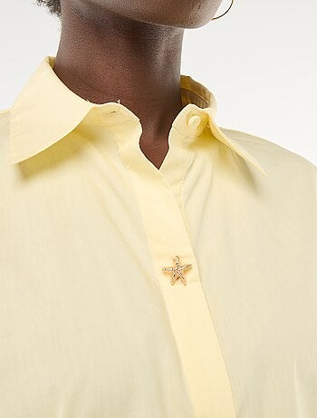 Camicia ampia con bottoni a stella