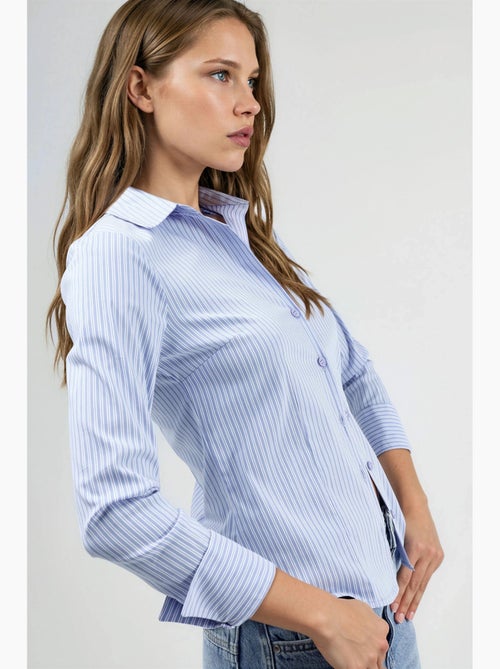 Camicia basic a righe aderente hiccup - Kiabi Camicia basic a righe aderente hiccup - Kiabi