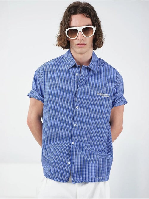 Camicia casual a quadri con bottoni e maniche corte giesto - Kiabi Camicia casual a quadri con bottoni e maniche corte giesto - Kiabi