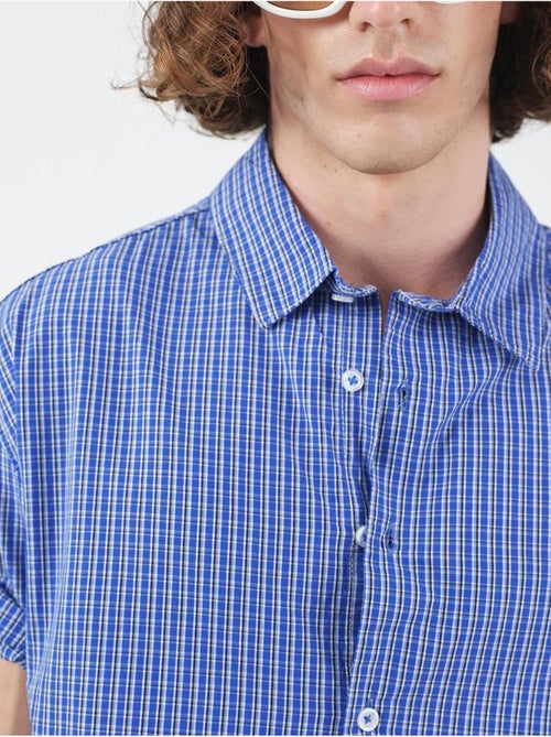 Camicia casual a quadri con bottoni e maniche corte giesto - Kiabi Camicia casual a quadri con bottoni e maniche corte giesto - Kiabi