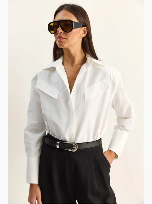 Camicia casual in popeline a maniche lunghe con bottoni e taschino lucci - Kiabi Camicia casual in popeline a maniche lunghe con bottoni e taschino lucci - Kiabi