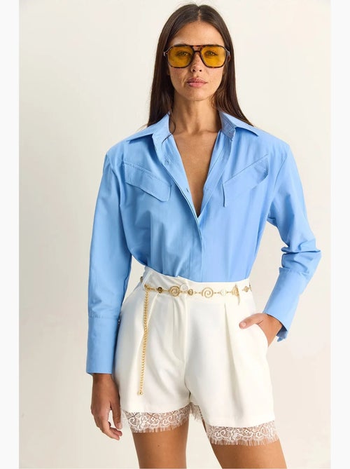 Camicia casual in popeline a maniche lunghe con bottoni e taschino lucci - Kiabi Camicia casual in popeline a maniche lunghe con bottoni e taschino lucci - Kiabi