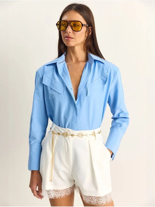 Camicia casual in popeline a maniche lunghe con bottoni e taschino lucci - Kiabi Camicia casual in popeline a maniche lunghe con bottoni e taschino lucci - Kiabi
