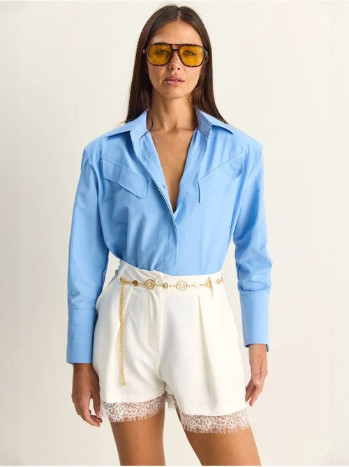 Camicia casual in popeline a maniche lunghe con bottoni e taschino lucci - Kiabi Camicia casual in popeline a maniche lunghe con bottoni e taschino lucci - Kiabi