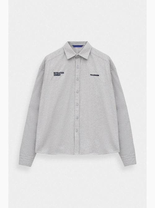 Camicia classica con bottoni giesto - Kiabi Camicia classica con bottoni giesto - Kiabi