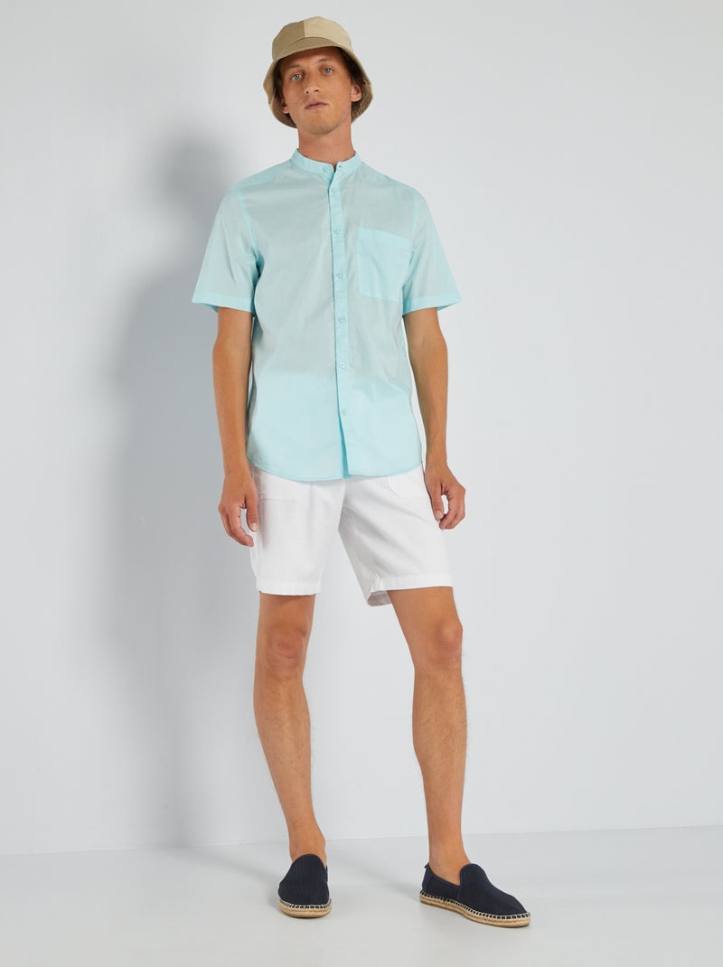 Camicia da uomo stampa floreale azzurra con collo alla coreana.