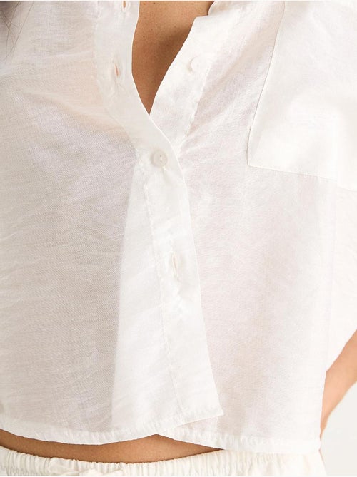 Camicia con tasca singola e mezza manica lucci - Kiabi Camicia con tasca singola e mezza manica lucci - Kiabi
