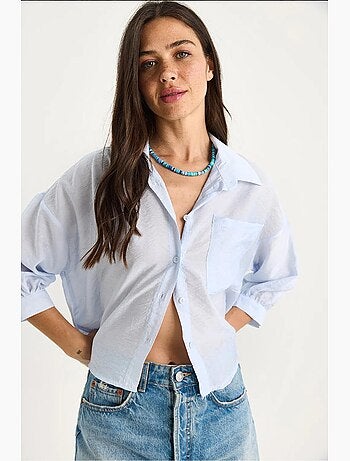Camicia con tasca singola e mezza manica lucci