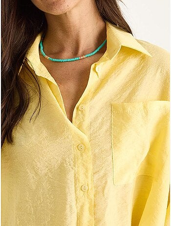 Camicia con tasca singola e mezza manica lucci