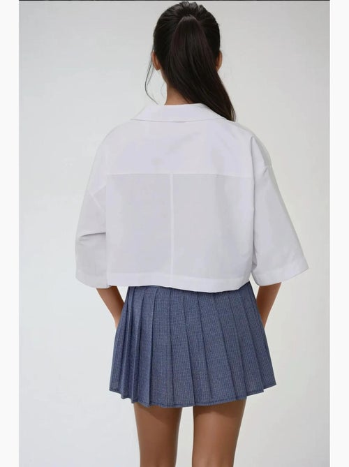 Camicia corta con dettaglio tasca hiccup - Kiabi Camicia corta con dettaglio tasca hiccup - Kiabi