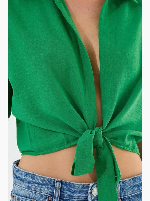 Camicia crop slim fit con scollo a v e chiusura con laccetto mixray - Kiabi Camicia crop slim fit con scollo a v e chiusura con laccetto mixray - Kiabi