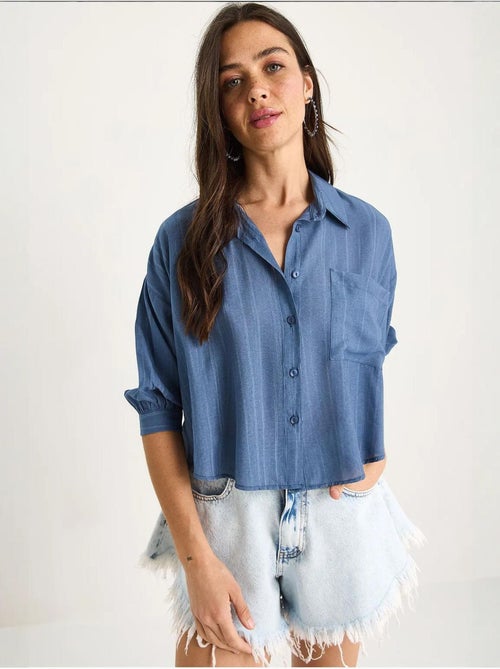 Camicia cropped a righe testurizzate con chiusura a bottoni e taschino lucci - Kiabi Camicia cropped a righe testurizzate con chiusura a bottoni e taschino lucci - Kiabi