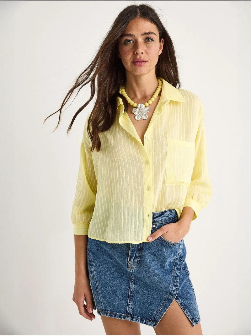 Camicia cropped a righe testurizzate con chiusura a bottoni e taschino lucci Giallo limone - Kiabi