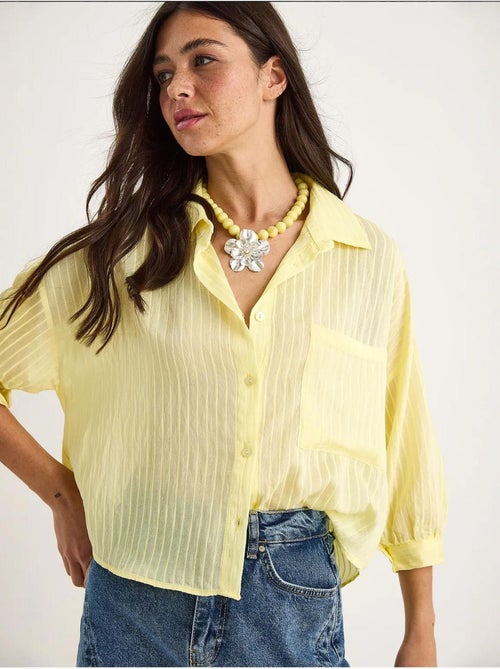 Camicia cropped a righe testurizzate con chiusura a bottoni e taschino lucci - Kiabi Camicia cropped a righe testurizzate con chiusura a bottoni e taschino lucci - Kiabi
