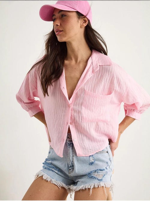 Camicia cropped a righe testurizzate con chiusura a bottoni e taschino lucci - Kiabi Camicia cropped a righe testurizzate con chiusura a bottoni e taschino lucci - Kiabi