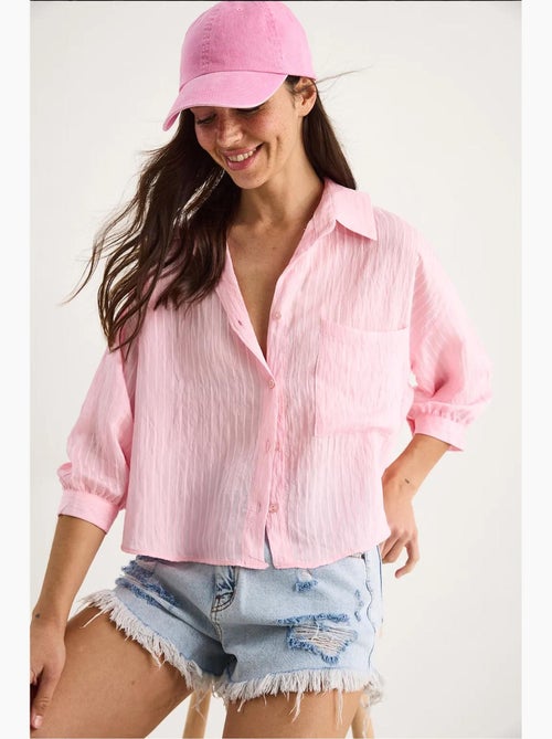 Camicia cropped a righe testurizzate con chiusura a bottoni e taschino lucci - Kiabi Camicia cropped a righe testurizzate con chiusura a bottoni e taschino lucci - Kiabi