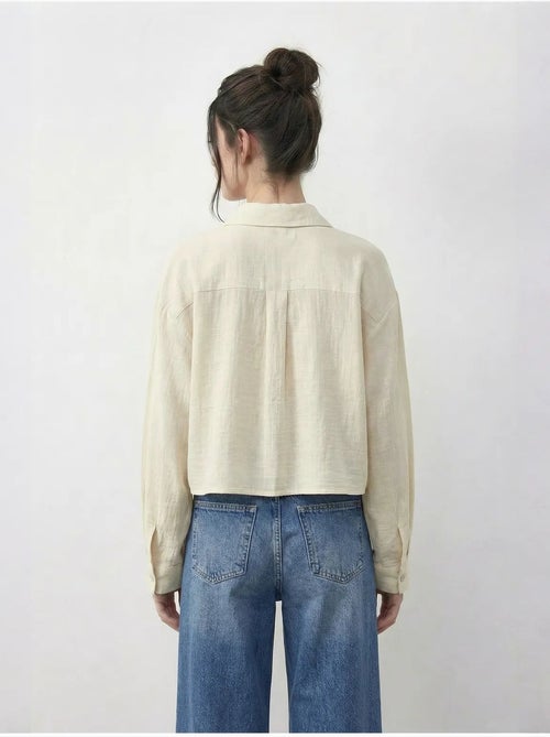 Camicia cropped ricamata con chiusura a bottoni lucci - Kiabi Camicia cropped ricamata con chiusura a bottoni lucci - Kiabi
