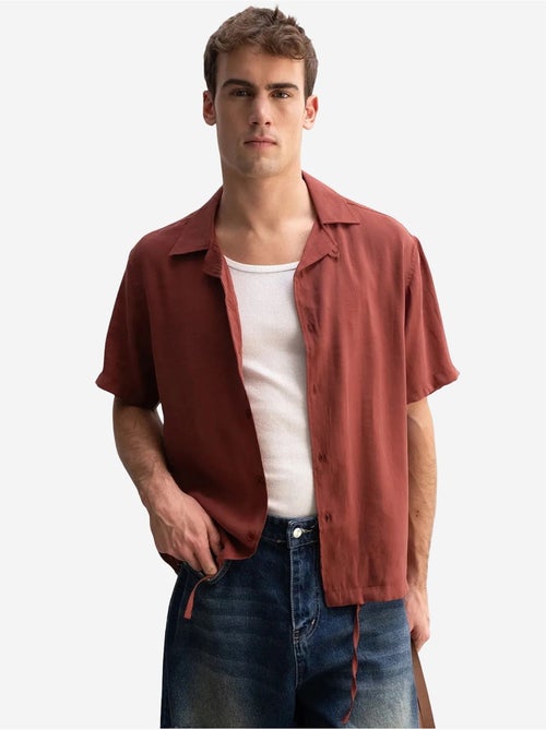 Camicia da uomo a maniche corte con colletto aperto giesto - Kiabi Camicia da uomo a maniche corte con colletto aperto giesto - Kiabi