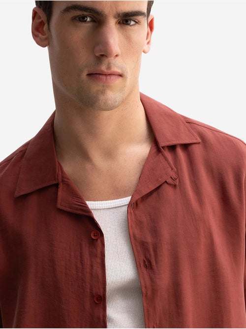 Camicia da uomo a maniche corte con colletto aperto giesto - Kiabi Camicia da uomo a maniche corte con colletto aperto giesto - Kiabi