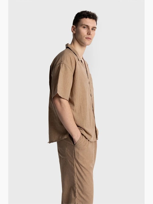 Camicia da uomo a maniche corte vestibilità rilassata giesto - Kiabi Camicia da uomo a maniche corte vestibilità rilassata giesto - Kiabi