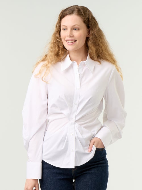 Camicia dal taglio fantasia e aderente sul davanti - Kiabi Camicia dal taglio fantasia e aderente sul davanti - Kiabi