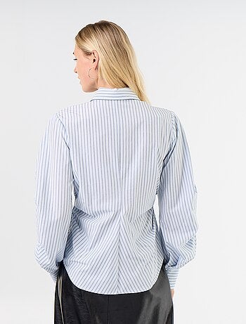 Camicia dal taglio fantasia e aderente sul davanti